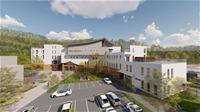 六龜區行政中心新建工程建築設計融入歷史氛圍，營造出與自然山林相融合的辦公空間
